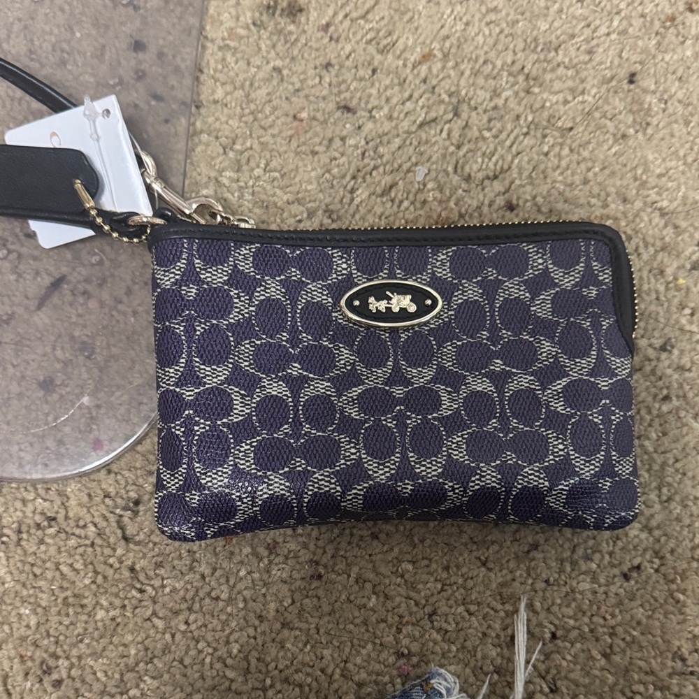 Coach Black and Cream Patterned Wristlet